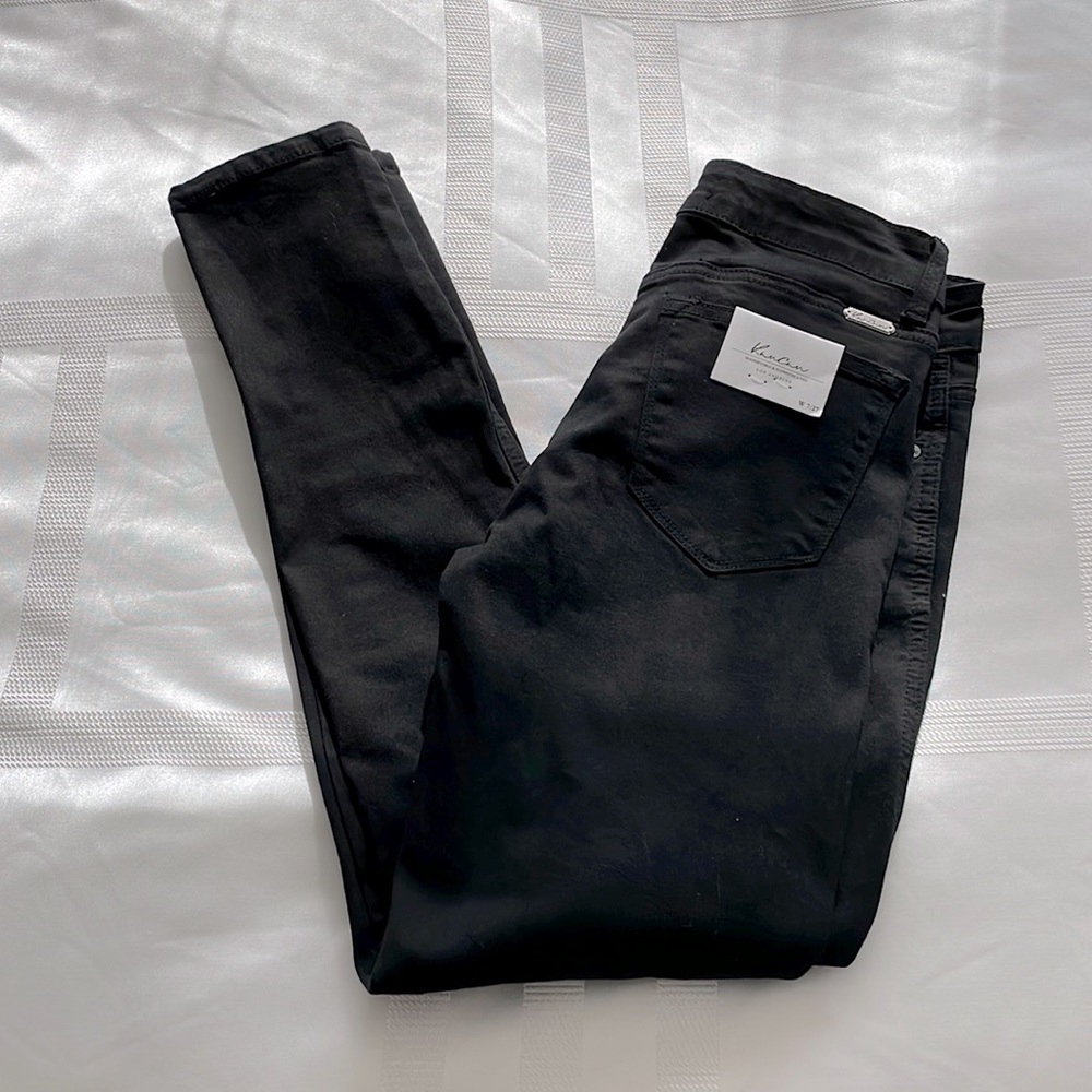 Blacked ripped jeans